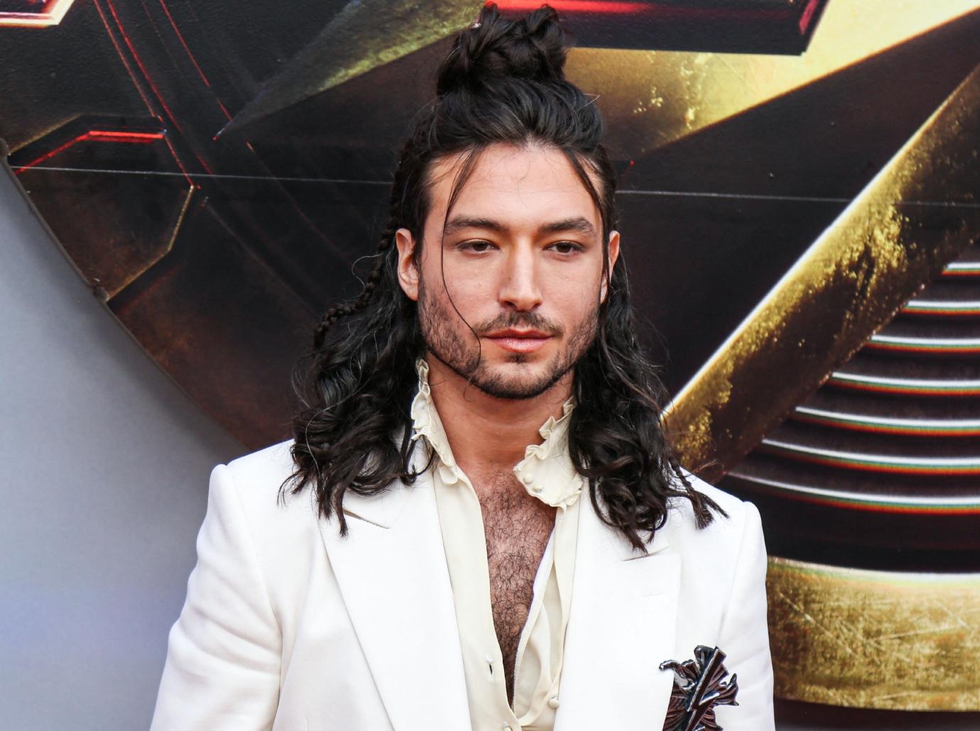 ezra miller the flash premiere harrasment felony charges photos