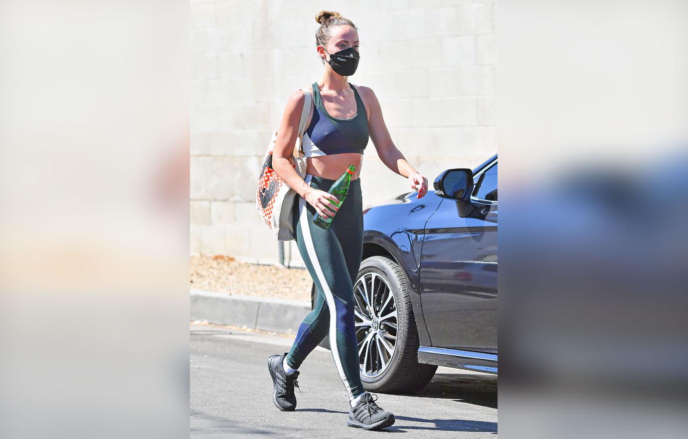 olivia wilde sports bra leggings face mask gym