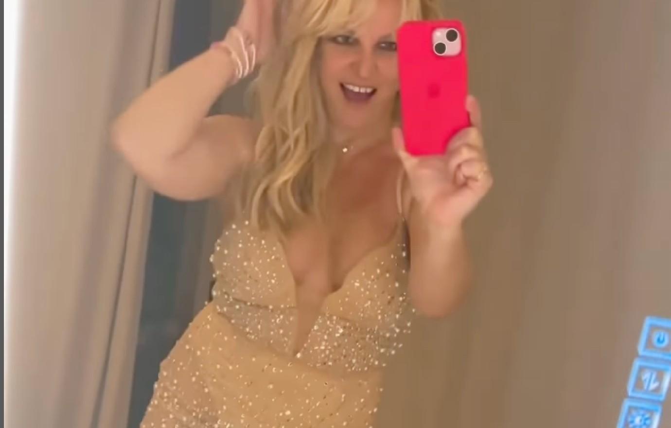 britney spears stuns models risque ensembles dressing room watch