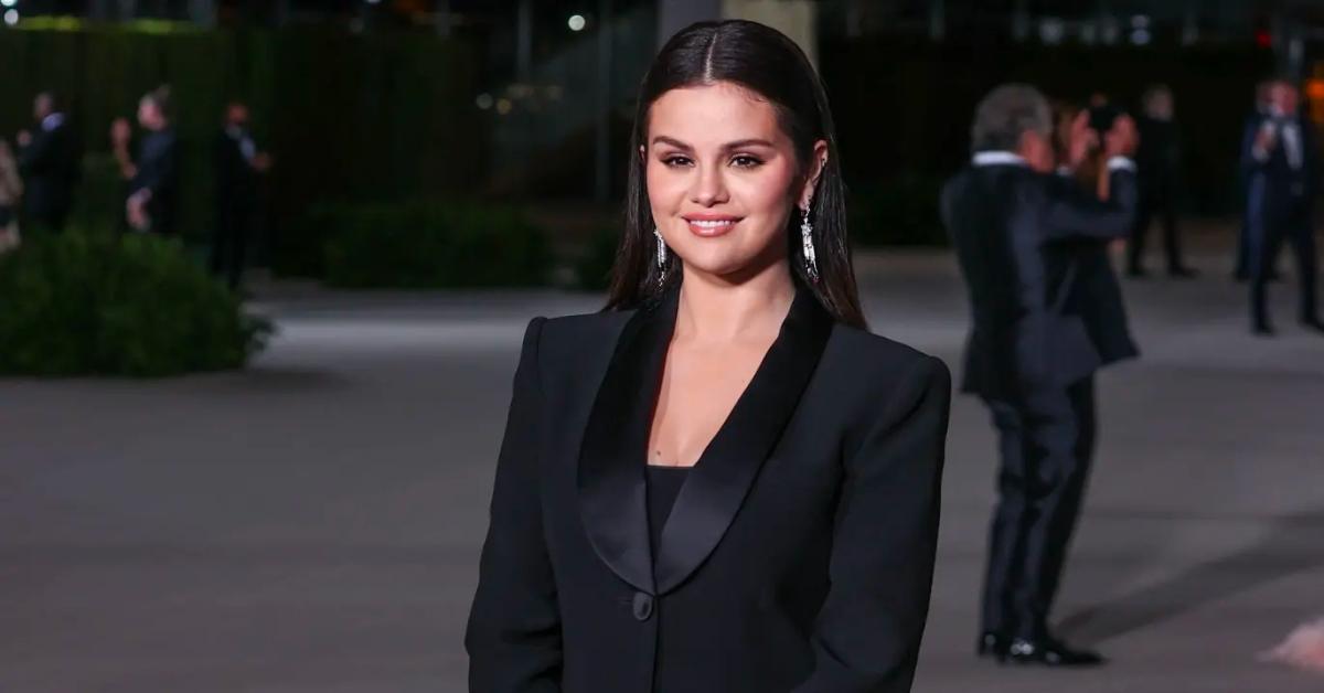 Selena Gomez stuns as she shows off her curves in a skintight nude bodysuit  and jean shorts for new photo
