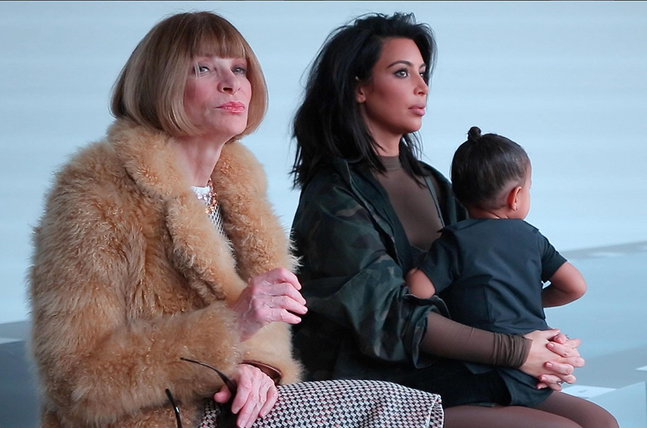 Kim Kardashian, Kanye West, and daughter all chat with Anna Wintour and watch his fashion show NYC