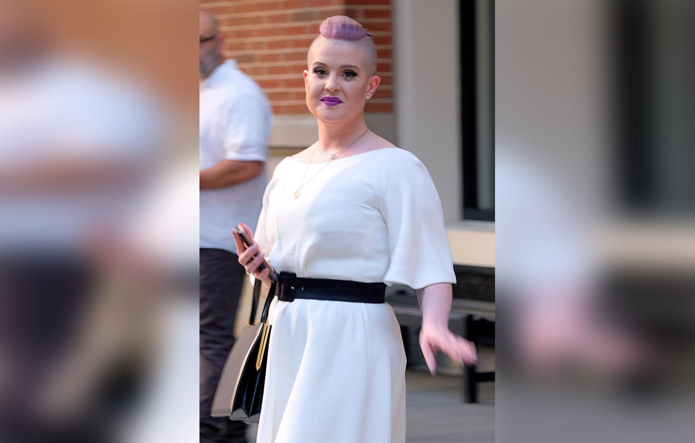 Kelly osbourne in white belted waist