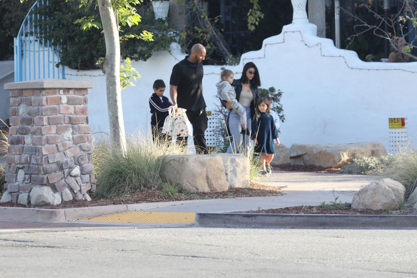 Kourtney Kardashian seen at a restaurant in Malibu with her kids and her nieces.