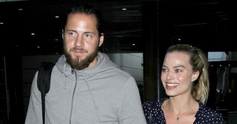 Margot Robbie and Tom Ackerley are a cute couple holding hands arriving at LAX Airport
