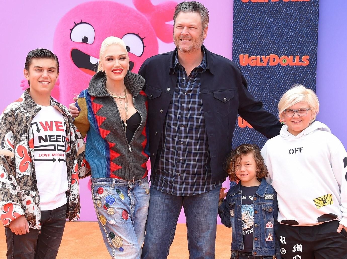 gwen stefani blake shelton kids nascar event instead attending grammys photos