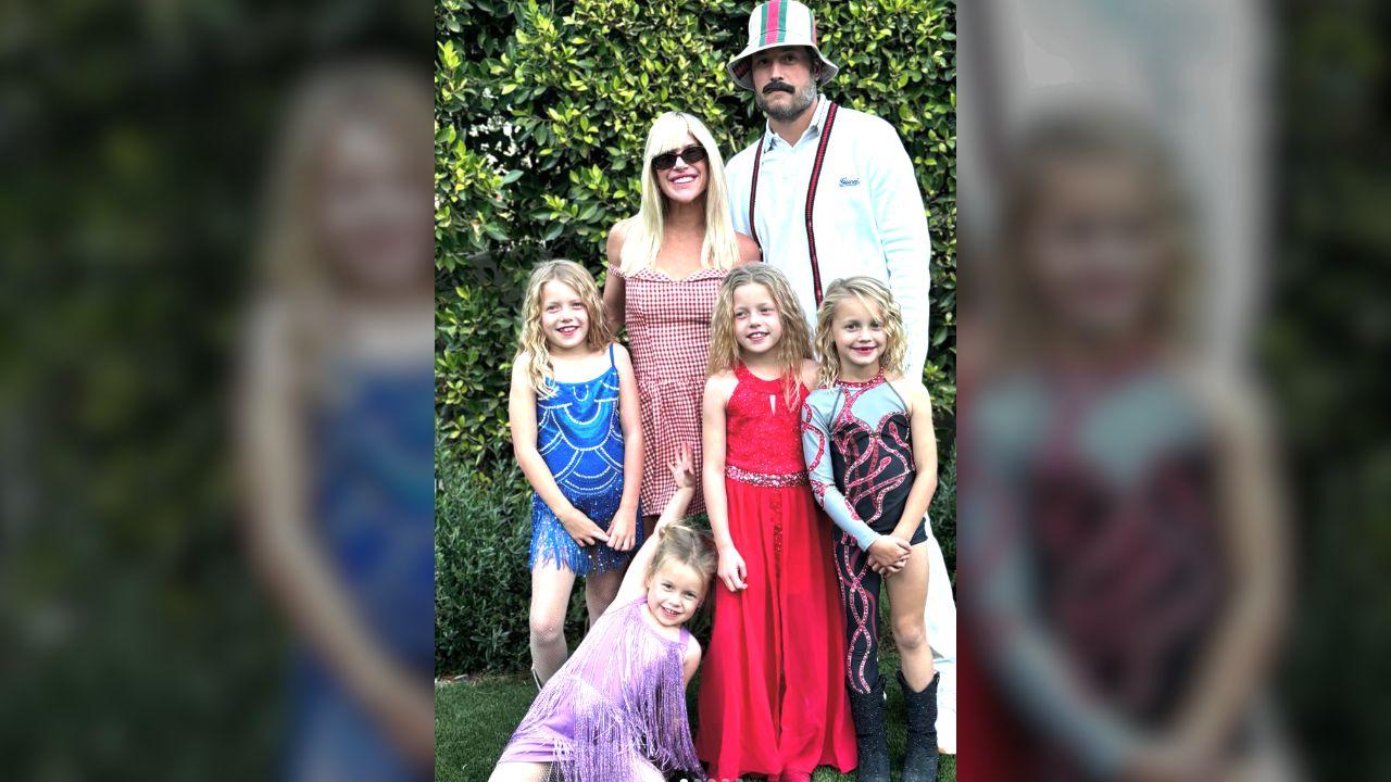 image of Kelly joked in an Instagram caption about having six Swifties in the house and one stubborn mustache.
