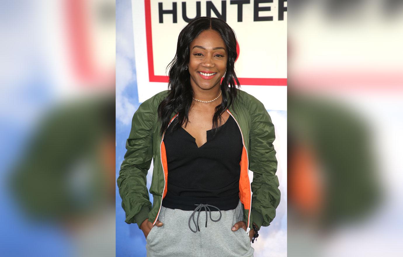 Tiffany haddish in green bomber jacket