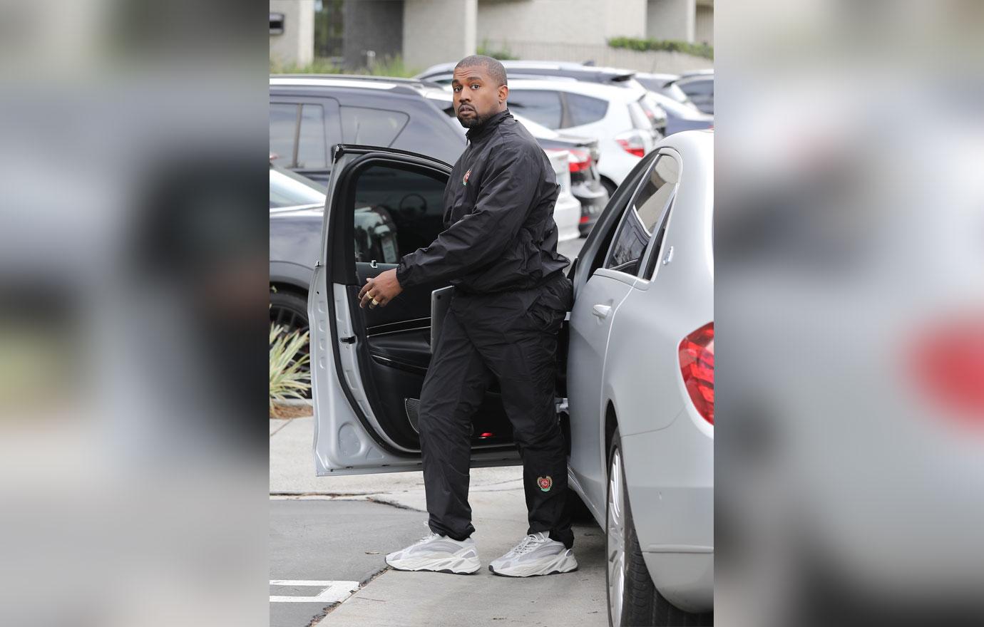 Kanye West heads to work after the arrival of baby #3