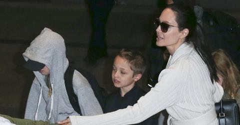 Angelina Jolie and kids touch back down in LA