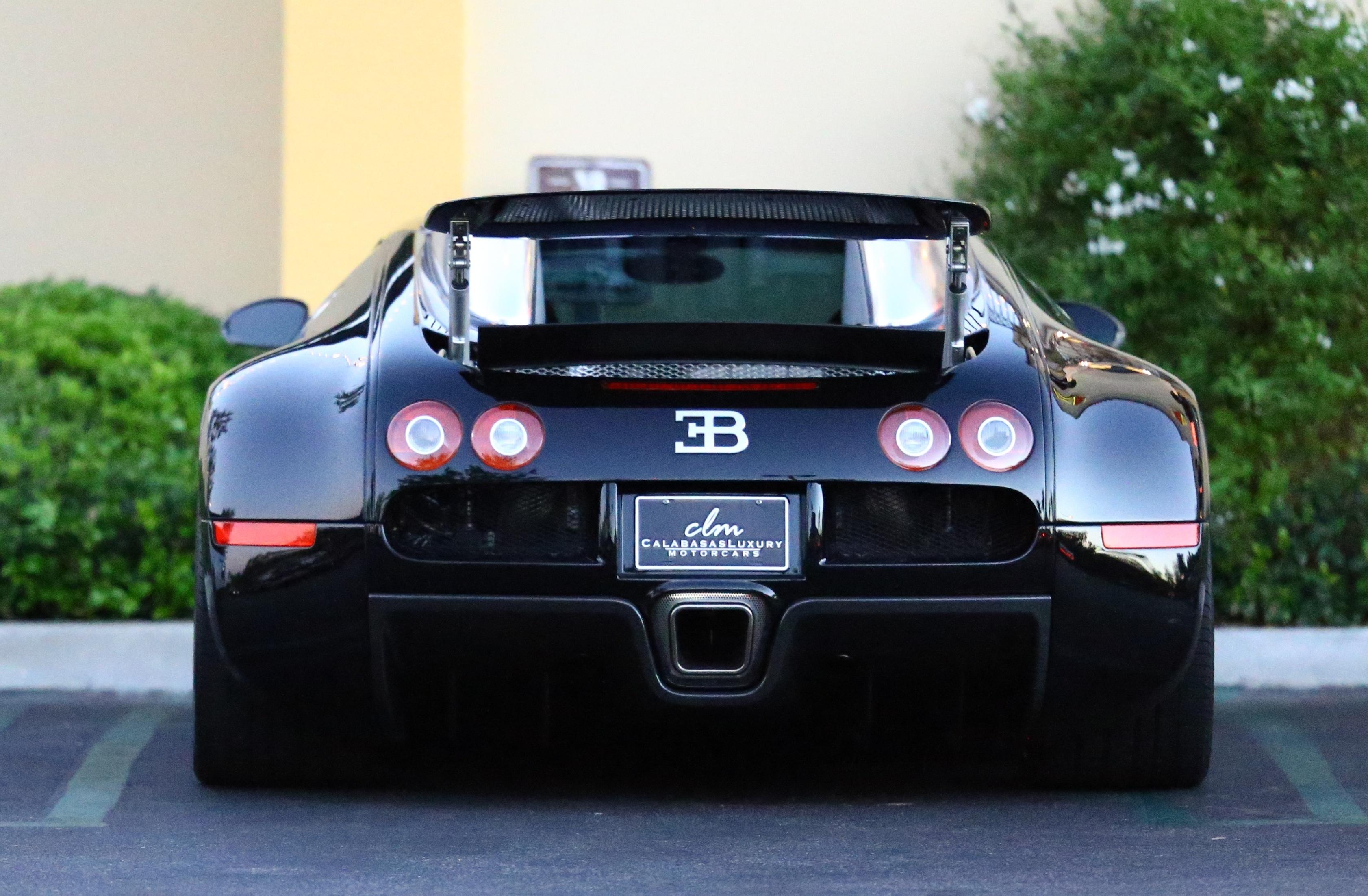 Pregnant Kourtney Kardashian and Scott Disick drive their new Bugatti to dinner