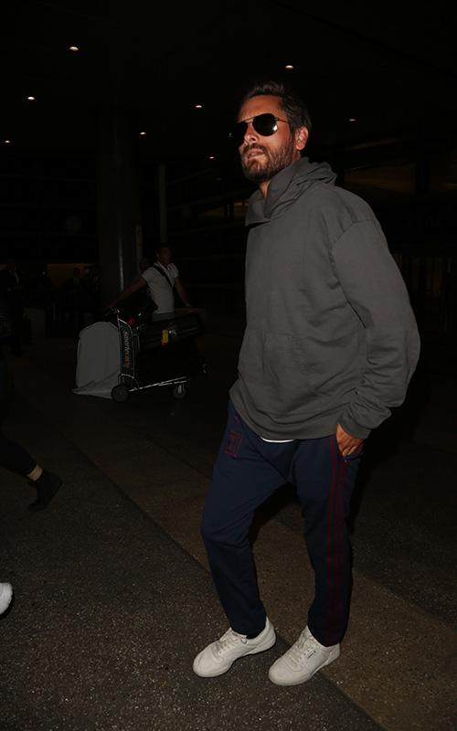 Scott Disick arrives to LAX after flying solo