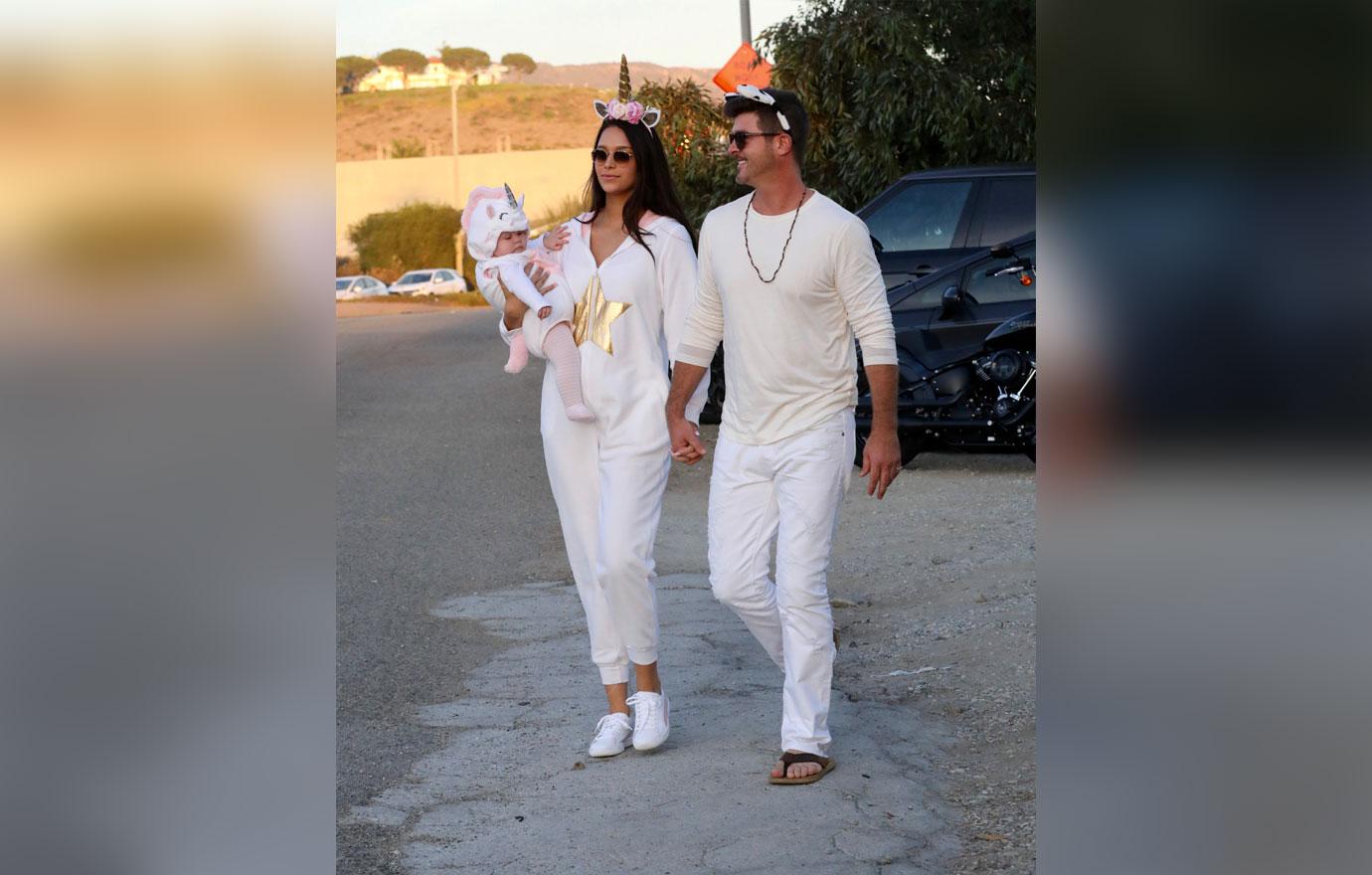 Robin Thicke and April Love Geary dressed up for Halloween in Malibu .