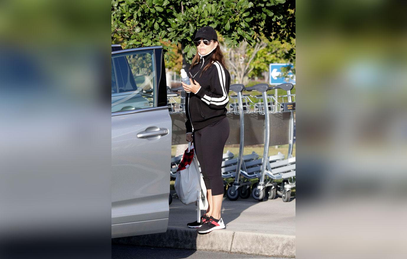 EXCLUSIVE: Eva Longoria arrives back in Australia with baby Santiago