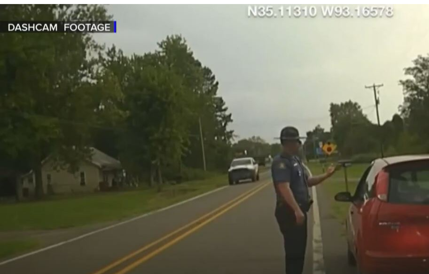 Police Dashcam Footage Captures Runaway Driver Fleeing Officer