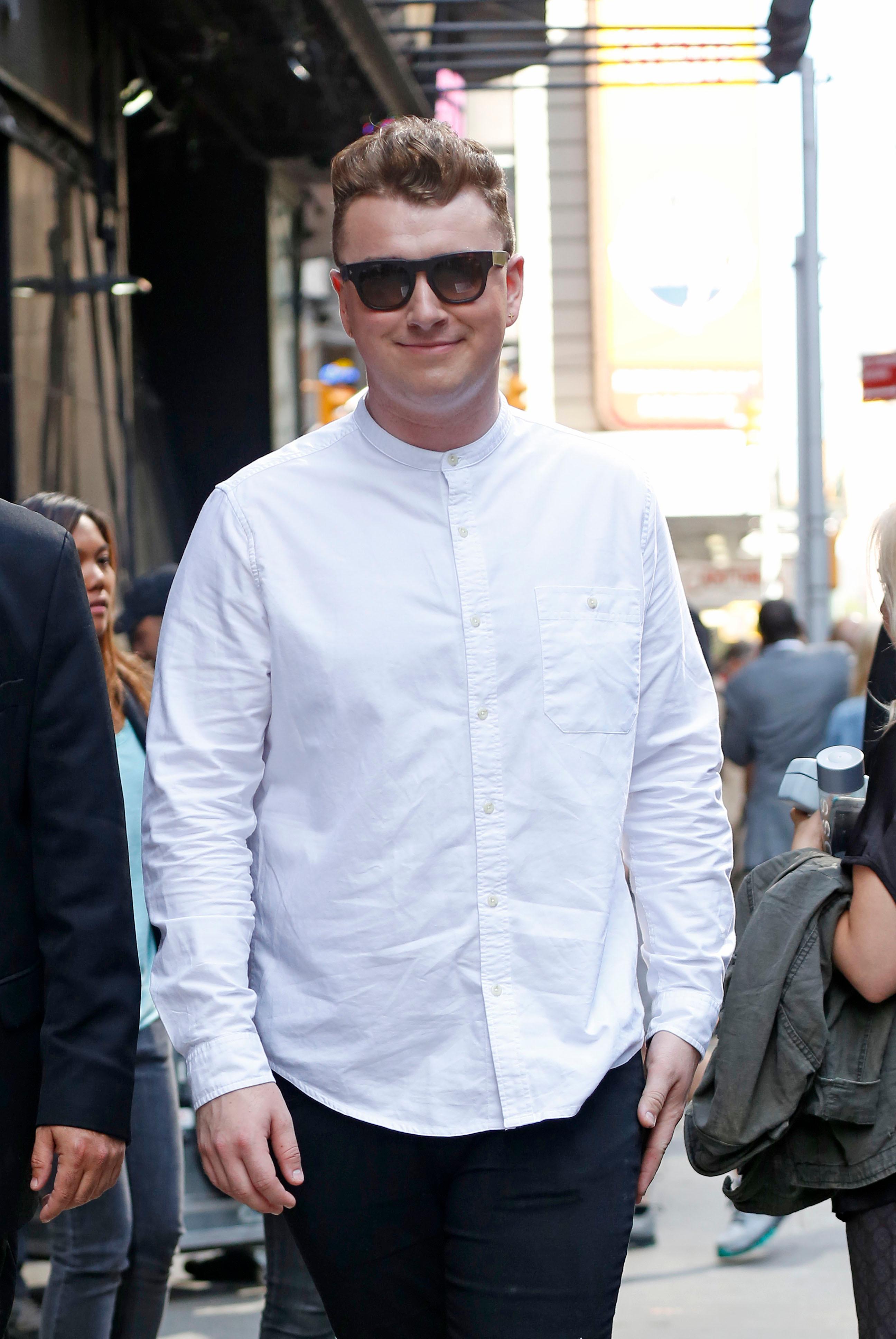 Sam Smith signs autographs for fans in New York City