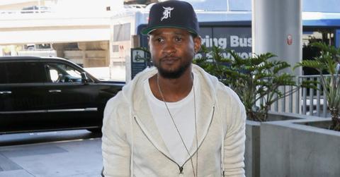 Usher takes a flight out of Los Angeles with his little guy