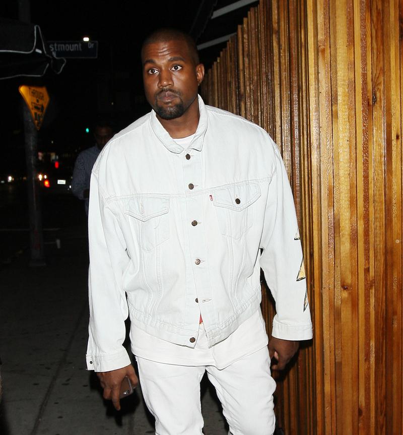 Kanye West parties at The Nice Guy club dressed all in white in West Hollywood