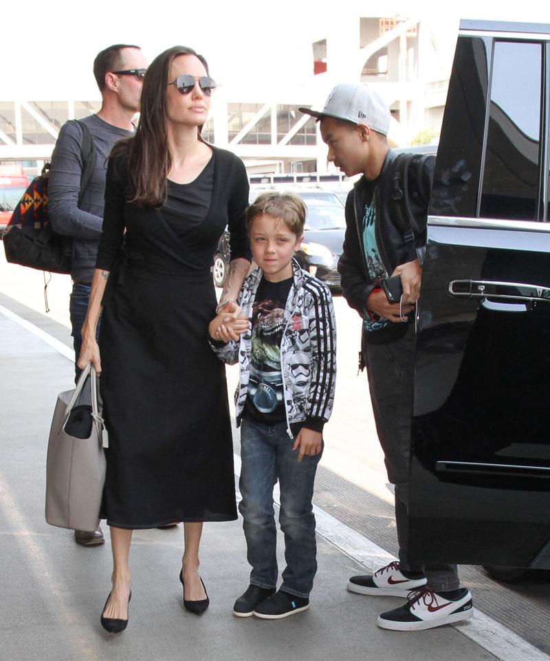 Angelina Jolie &amp; Kids Departing On A Flight At LAX