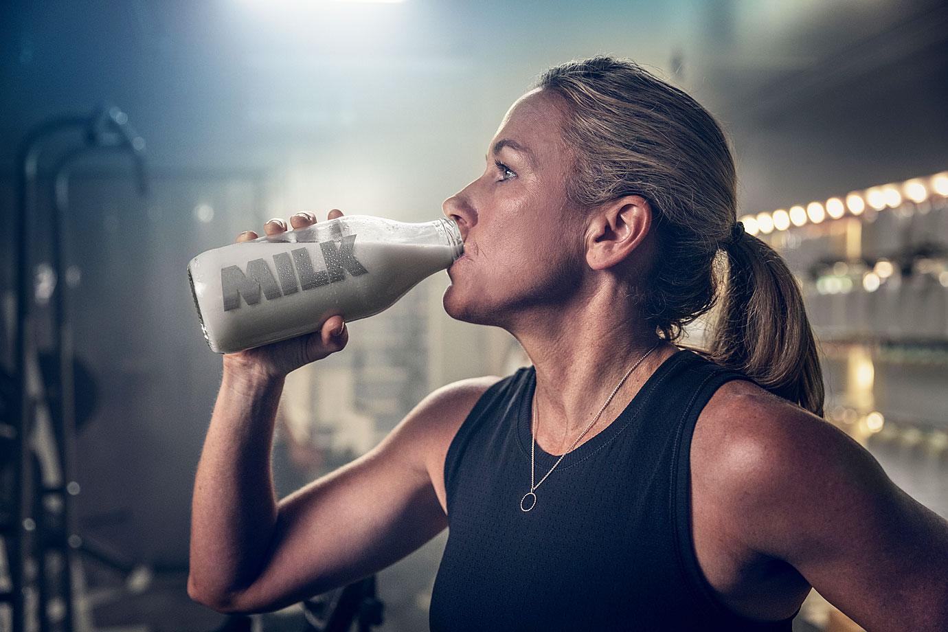 olympic gold medalist kristin armstrong drinks milk in the fridge