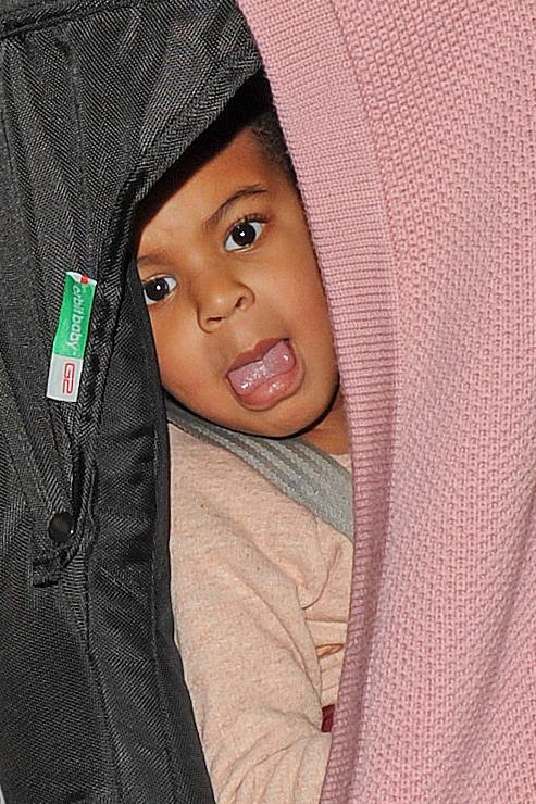 Blue Ivy Carter gets a peek of the paparazzi **USA ONLY**