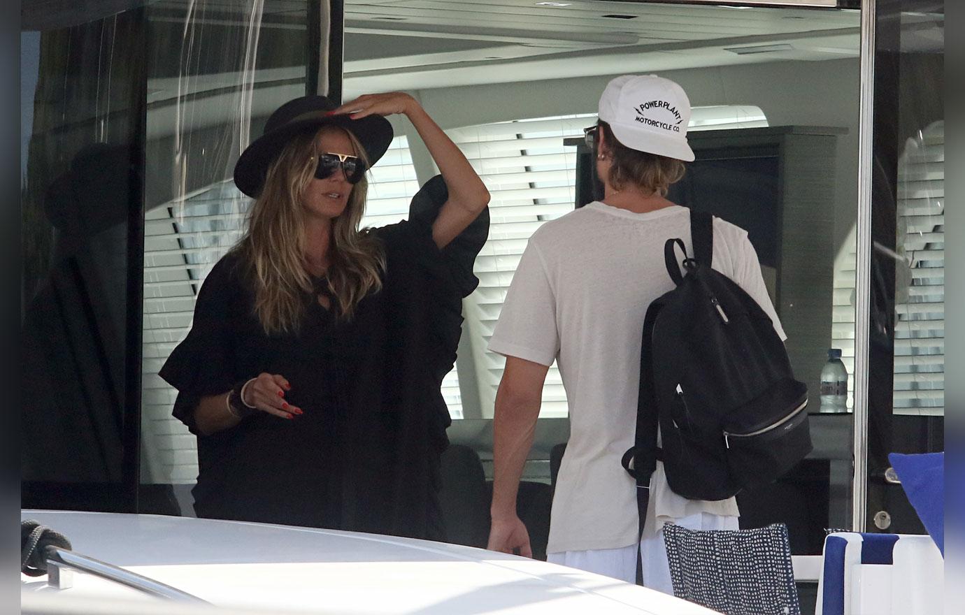 EXCLUSIVE: Heidi Klum and Tom Kaulitz sharing hot kisses before ending their Sardinia getaway