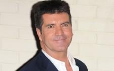 2010__01__Simon Cowell News Jan12 225&#215;141.jpg