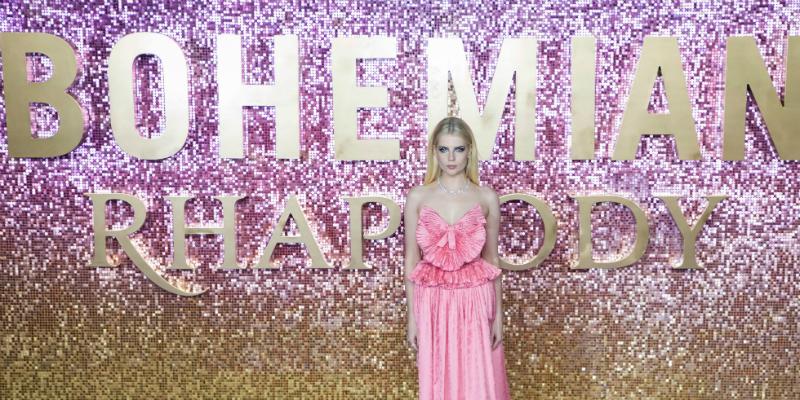 Lucy Boynton wears a sublime pink outfit on the red carpet.