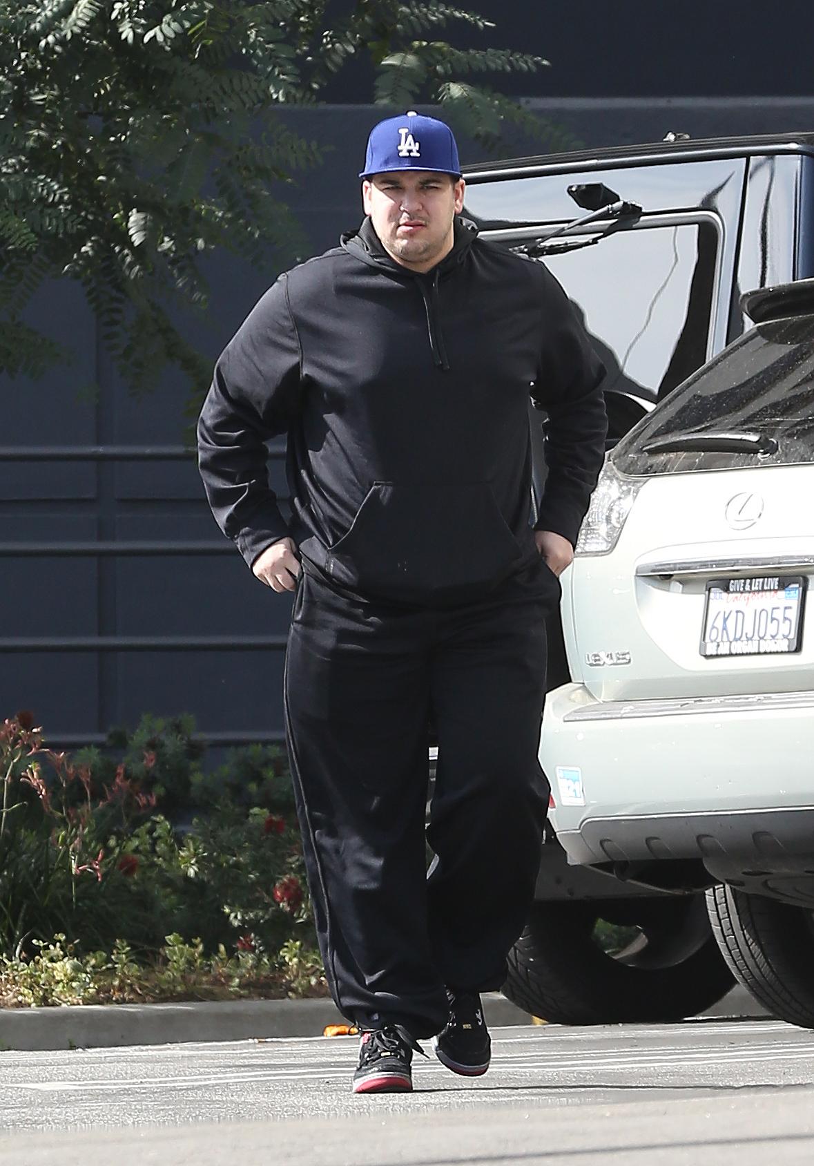 EXCLUSIVE: Rob Kardashian has a meeting in Los Angeles after he hits the gym