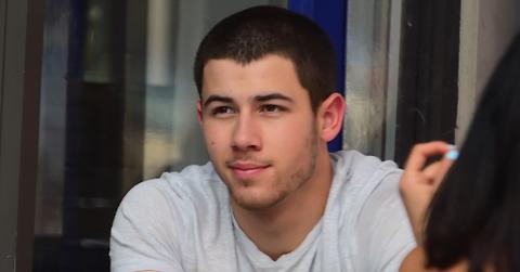 Nick Jonas looks glum as he eats lunch in the West Village