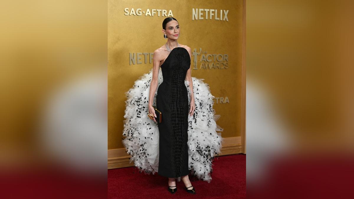 Image of Demi Moore conjured images of Big Bird with a large tulle accent on her dress.