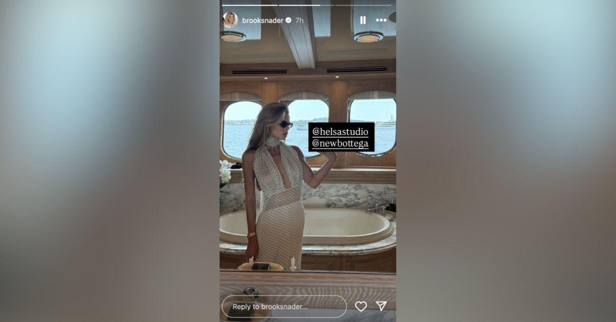 image of Brooks Nader wore a sheer polka dot dress during her vacation.
