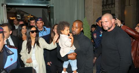 Kim Kardashian touch down in Yerevan Armenia and go straight to dinner with baby North and excited fans and cops surrounding them on theip first trip to Armenia