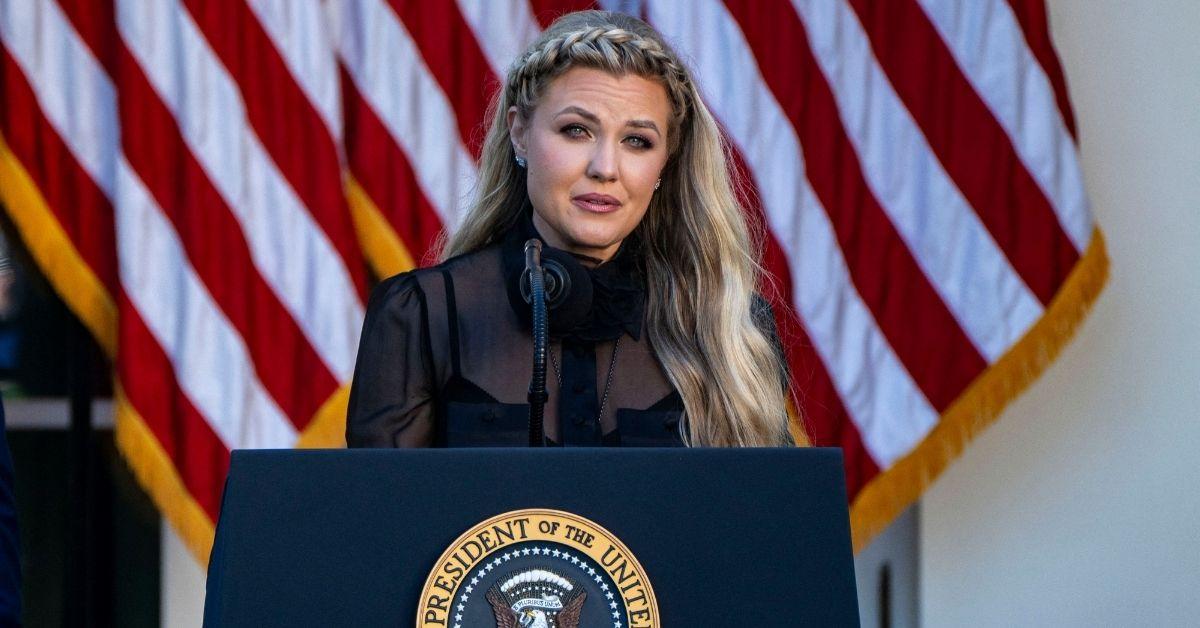 image of A lip reader revealed Erika Kirk told her assistant she 'didn’t want to go' on stage.