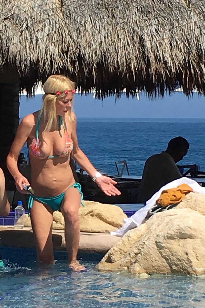 EXCLUSIVE: Tara Reid relaxes in a bikini at her hotel pool during a Mexican getaway