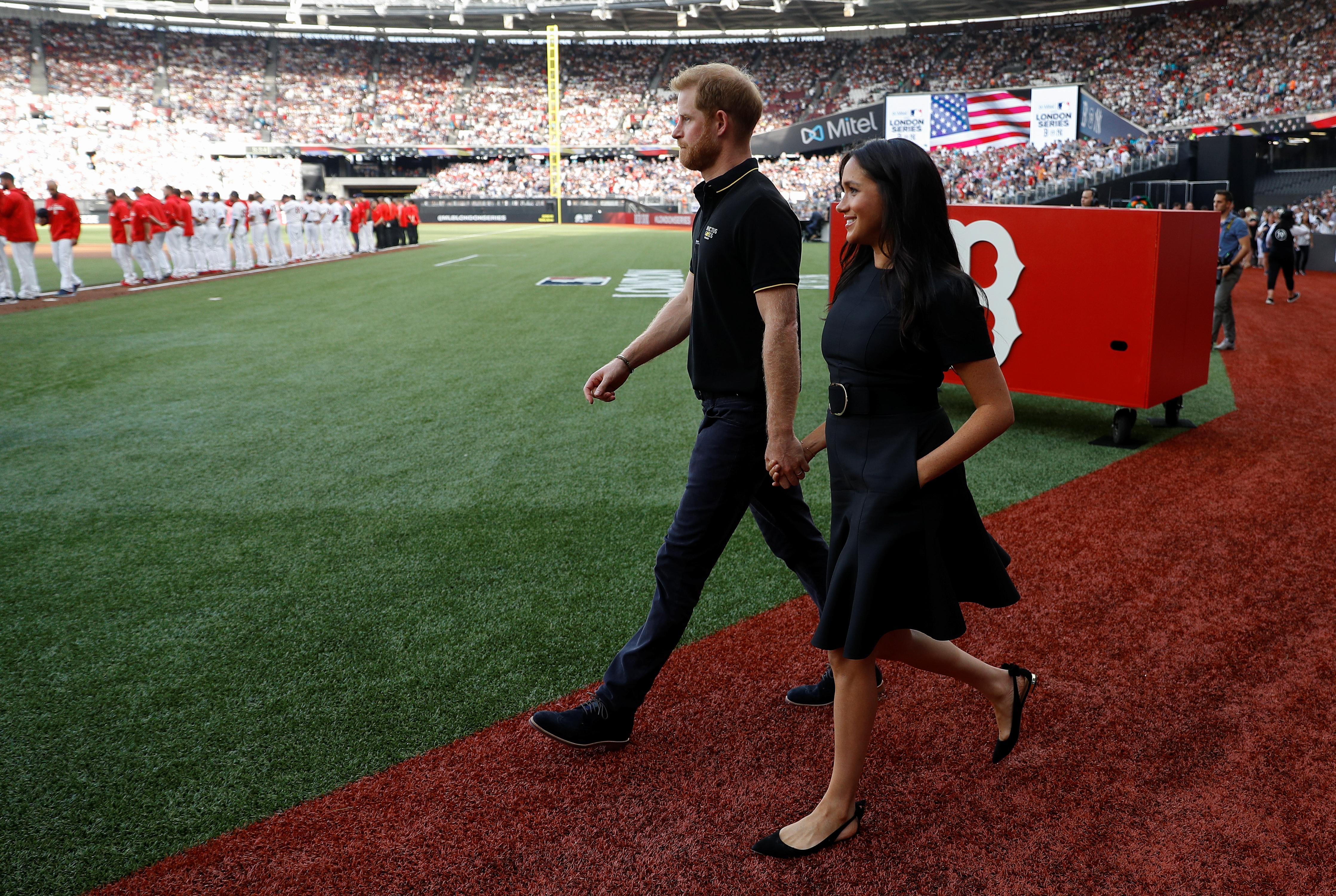 Meghan Markle & Prince Harry Make Appearance At Historic MLB Game