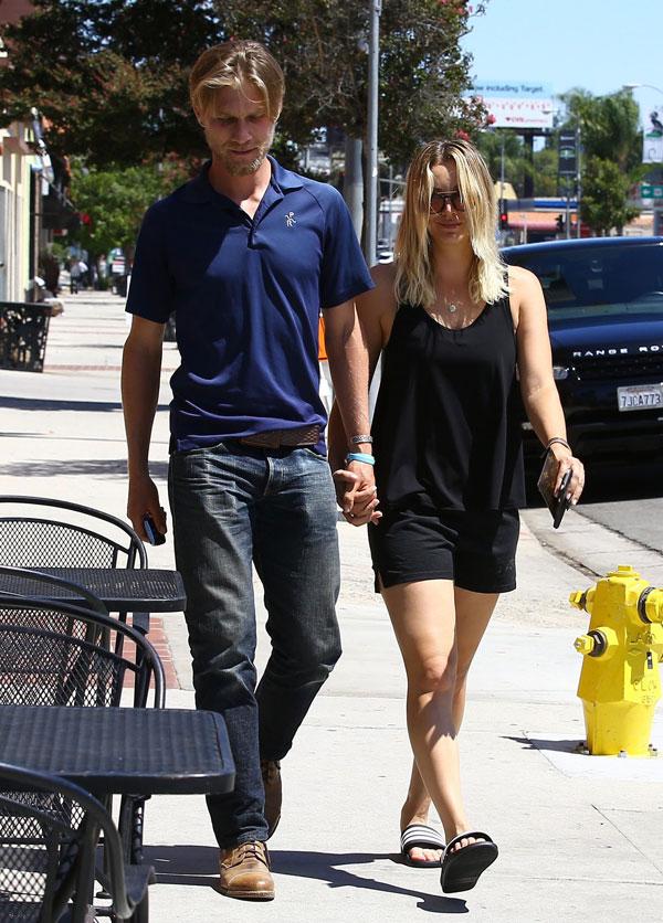 kaley cuoco karl cook date holding hands