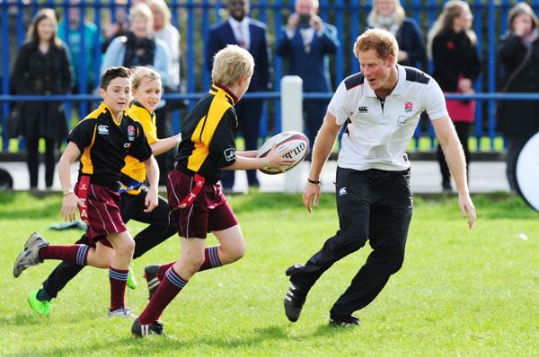 Prince harry plays rugby