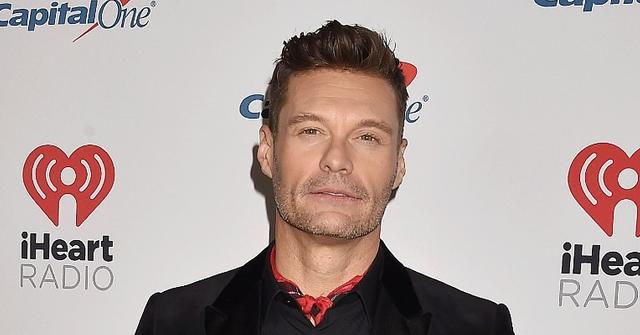 Ryan Seacrest Posting On The Red Carpet