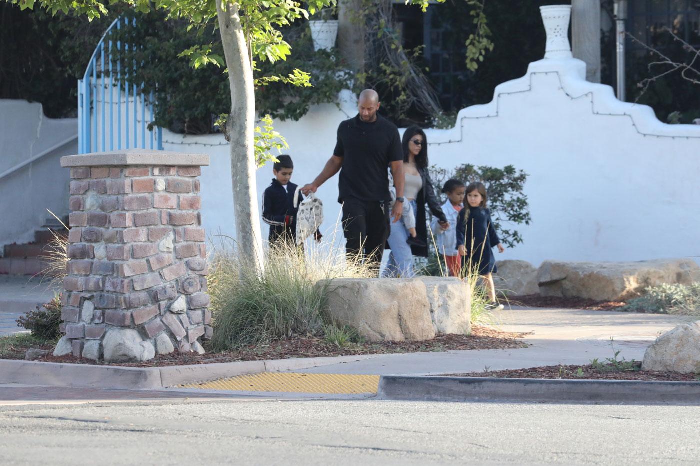 Kourtney Kardashian seen at a restaurant in Malibu with her kids and her nieces.