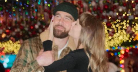 taylor swift travis kelce kiss lips christmas photo