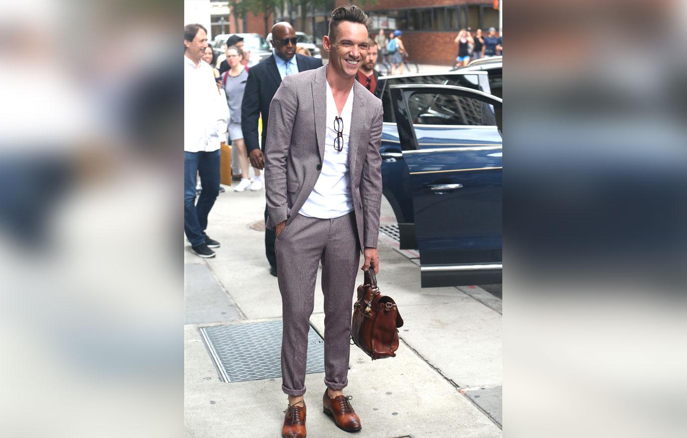 Jonathan rhys meyers smiling full length