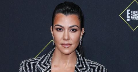 Kourtney Kardashian Wearing a Striped Suit