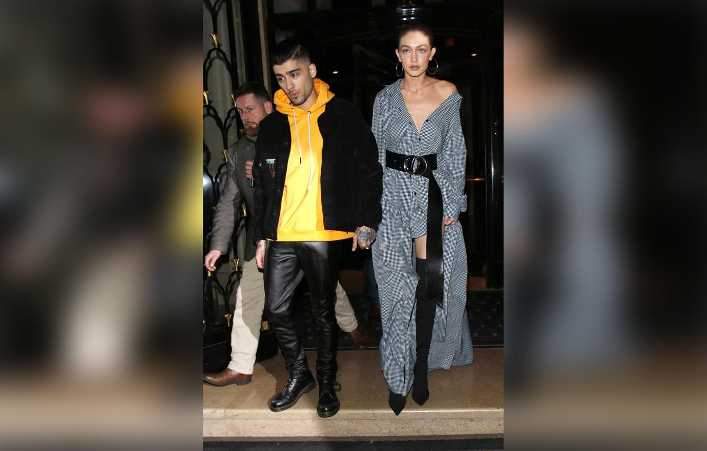 Gigi Hadid And Zayn Malik Exiting A Building