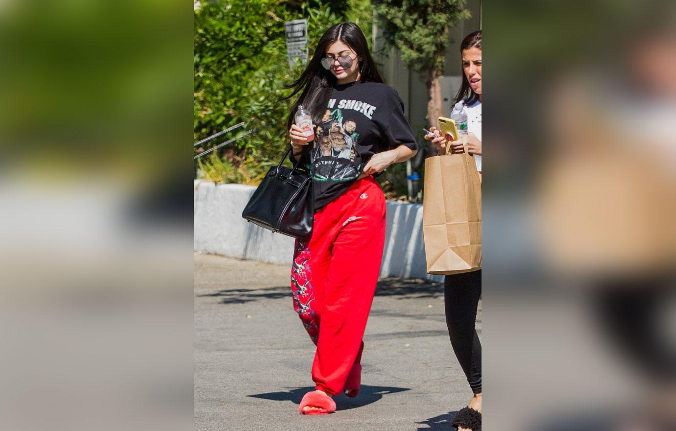 *EXCLUSIVE* Kylie Jenner wears red slippers and weed tee shirt