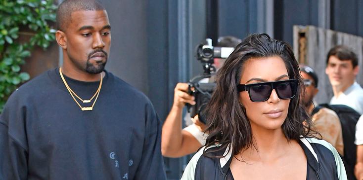 Kim Kardashian wears a see through bustier corset showing her cleavage while out with Kanye West in New York City