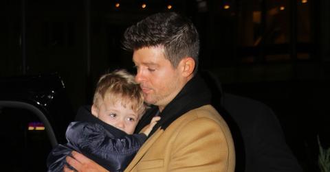 Robin Thicke takes tired son Julian home after performing at the Jingle Ball