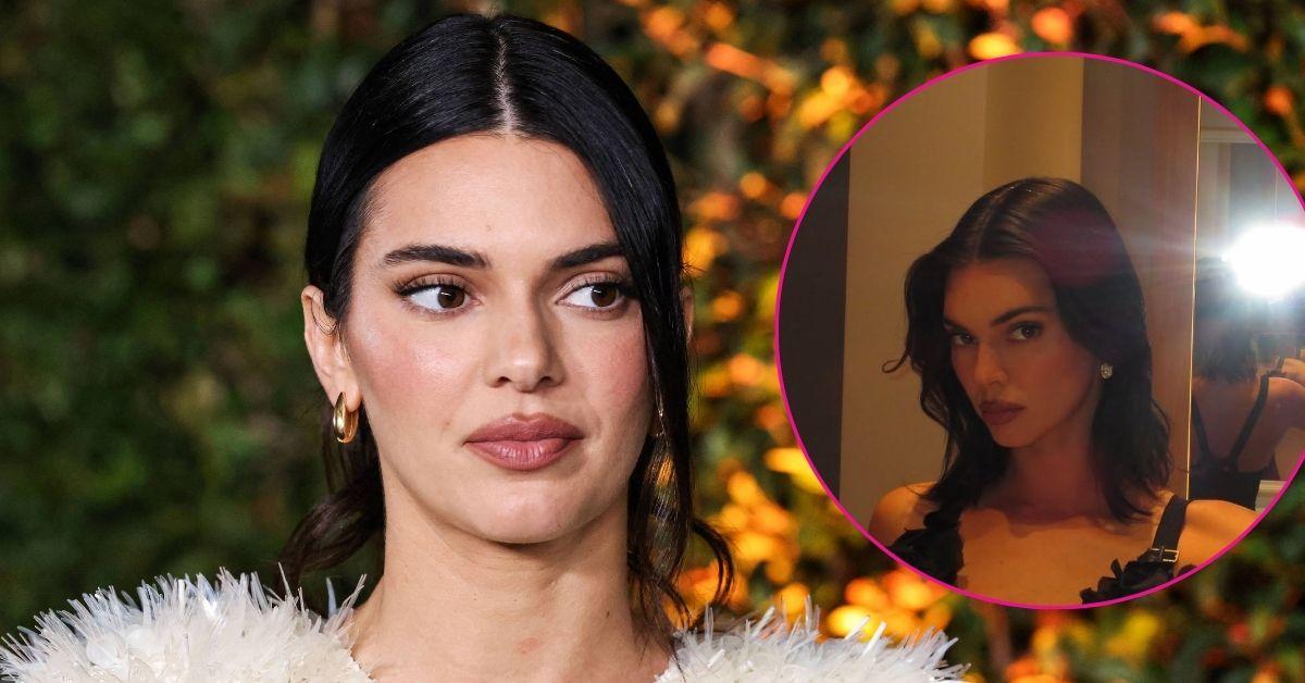 kendall jenner racy low cut black top photos