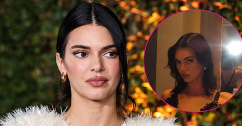 kendall jenner racy low cut black top photos