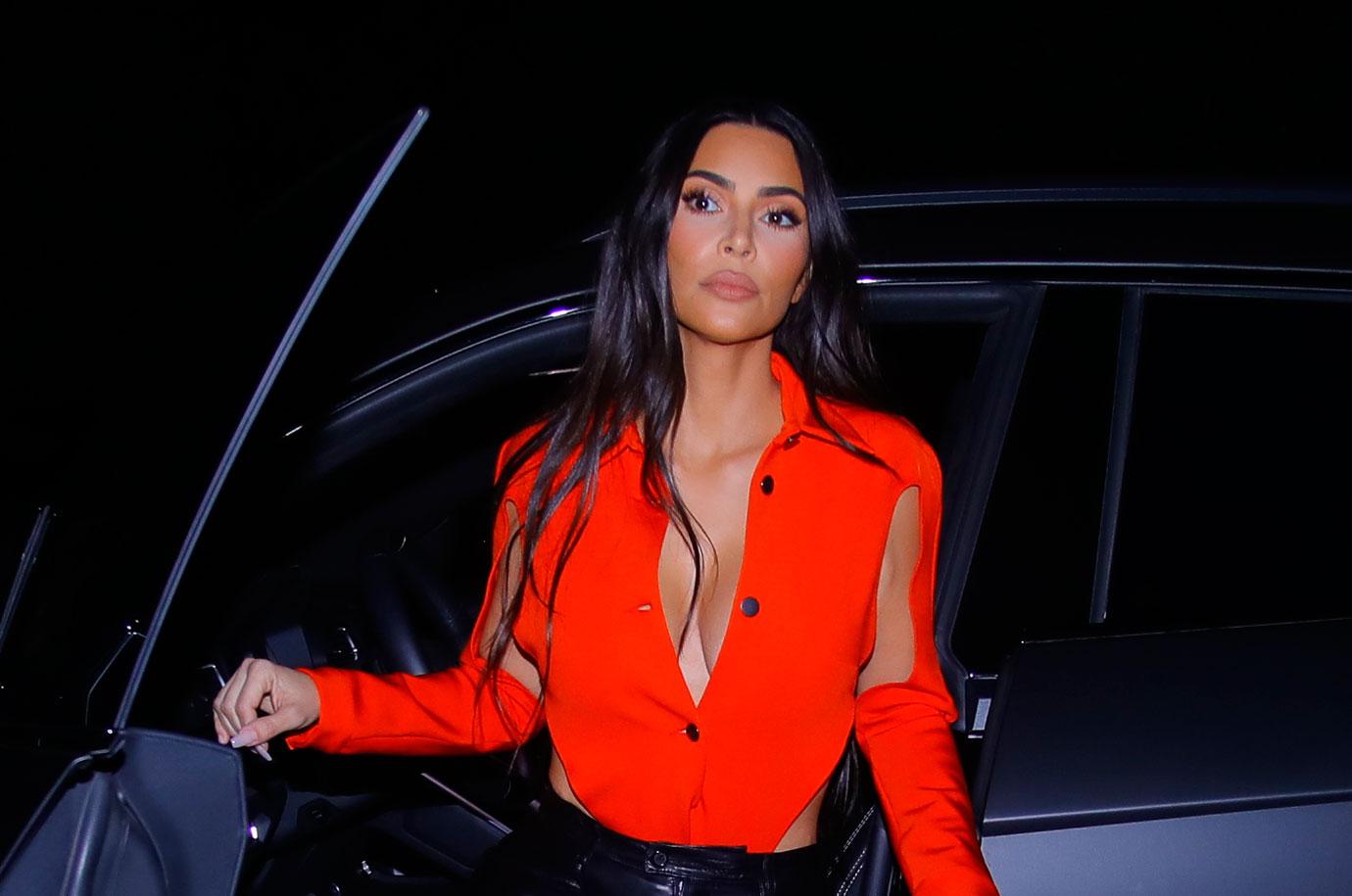 kim kardashian arriving lamborghini plunging neckline friends home dinner calabasas