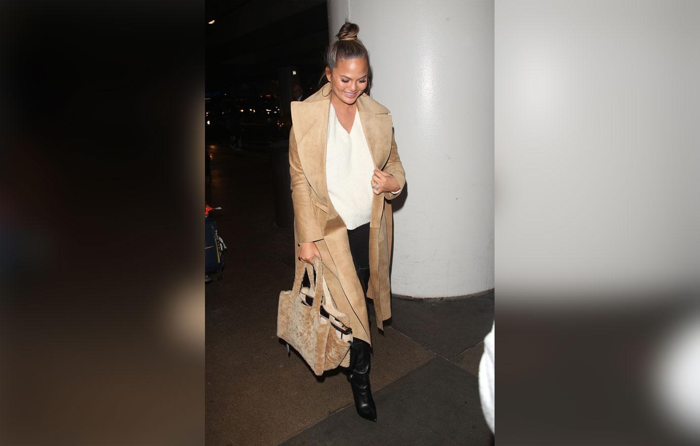 Chrissy Teigen keeps it chic for a late flight